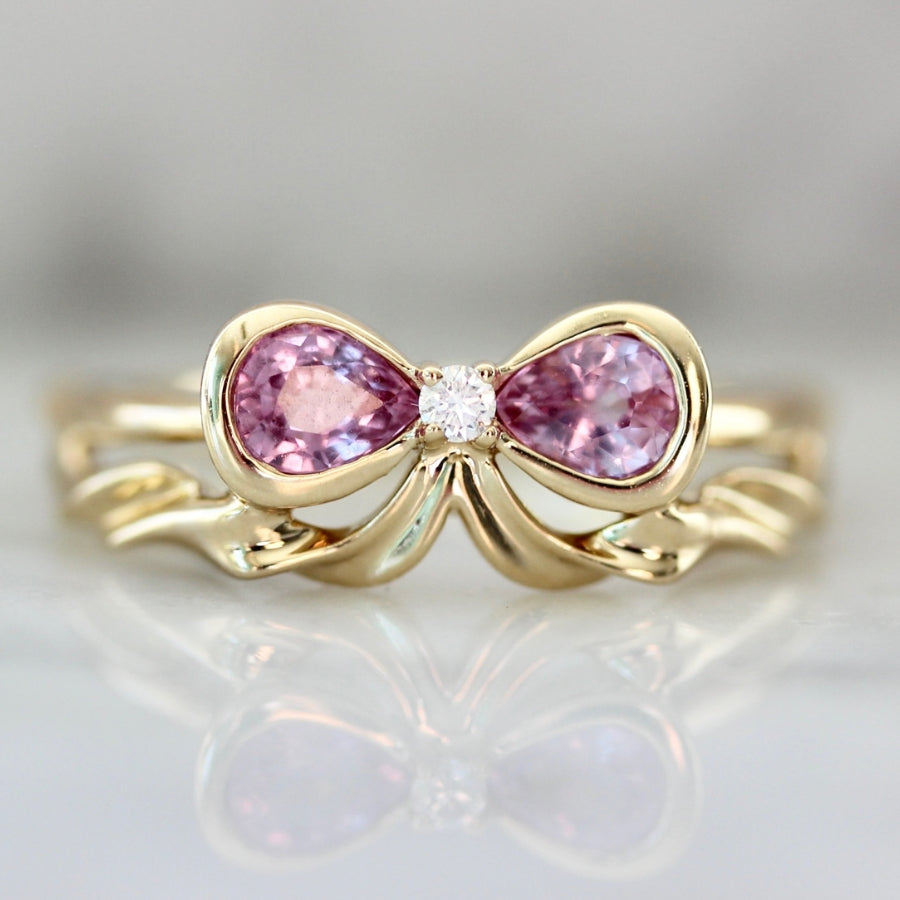 
            Bowtiful Pink Pear Sapphire Bow Ring