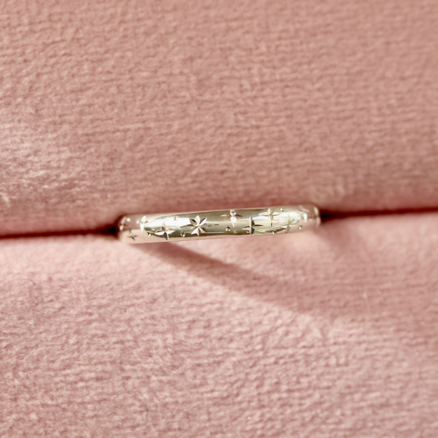 
            Celeste Major Star Engraved Sterling Silver Band