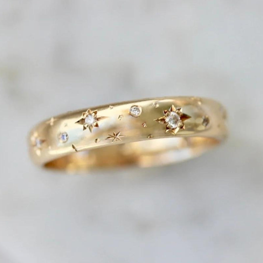 
            Celeste Rising Star Engraved Diamond Gold Band