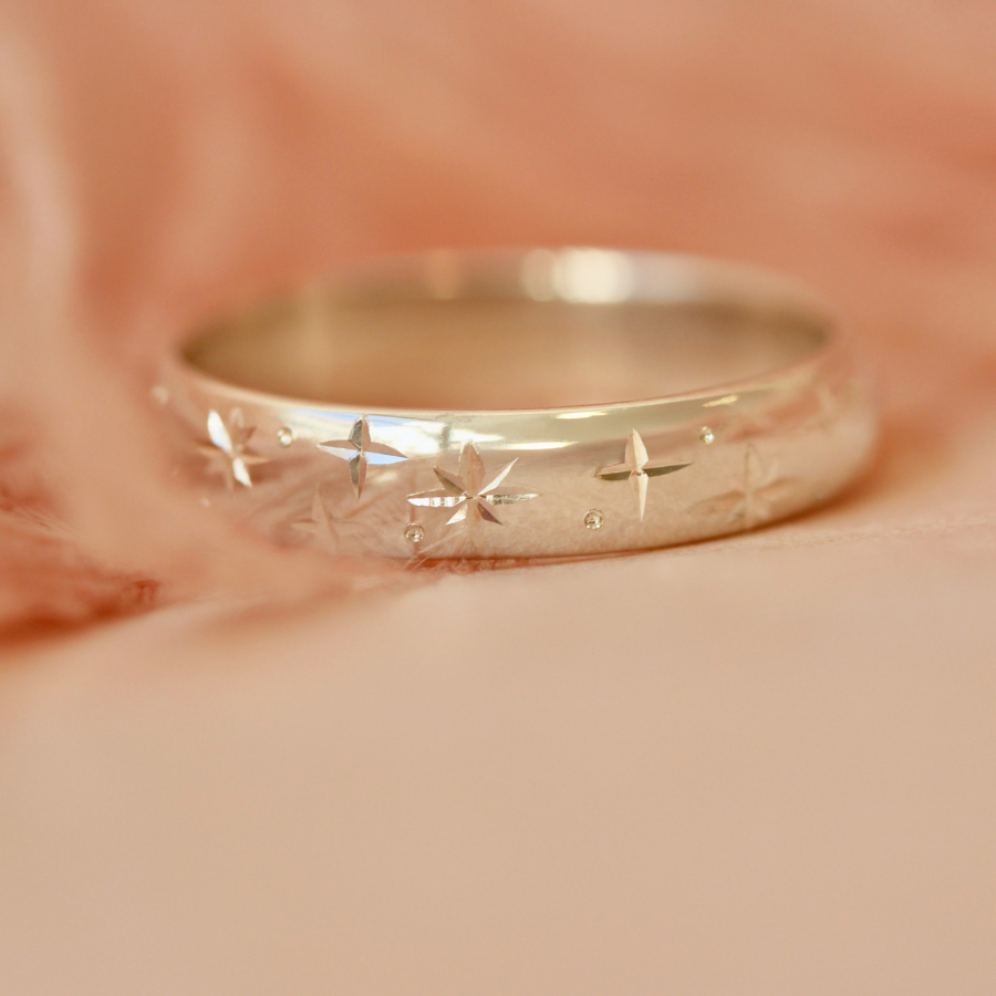 
            Celeste Rising Star Engraved Sterling Silver Band