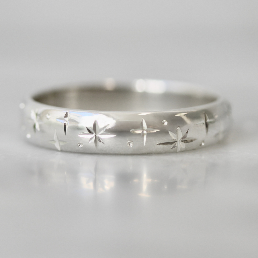 
            Celeste Rising Star Engraved Sterling Silver Band