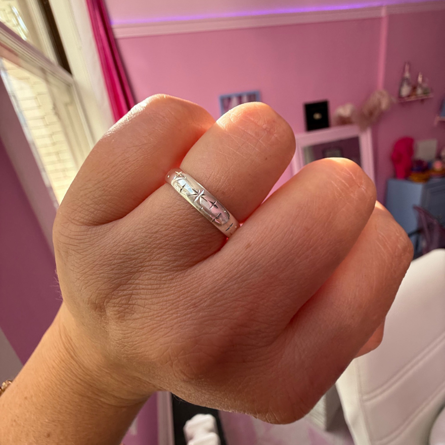 
            Celeste Rising Star Engraved Sterling Silver Band