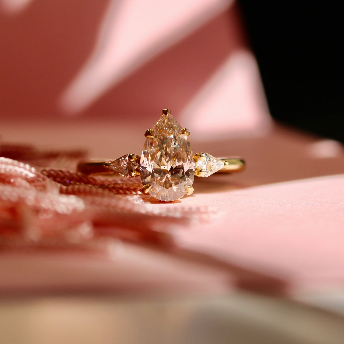 
            Champagne pear cut diamond ring