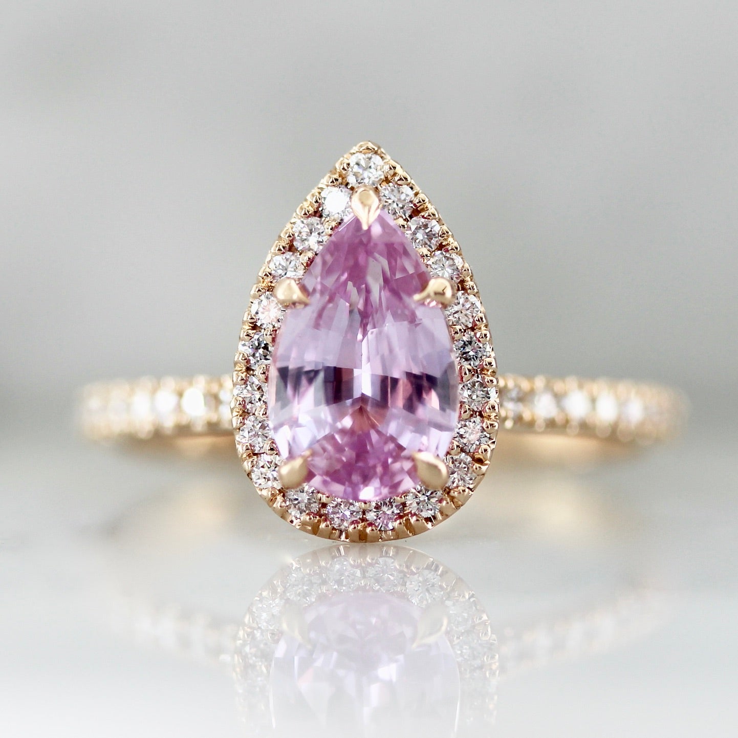 5175 - Pink Sapphire with diamond halo in peach gold engagement ring