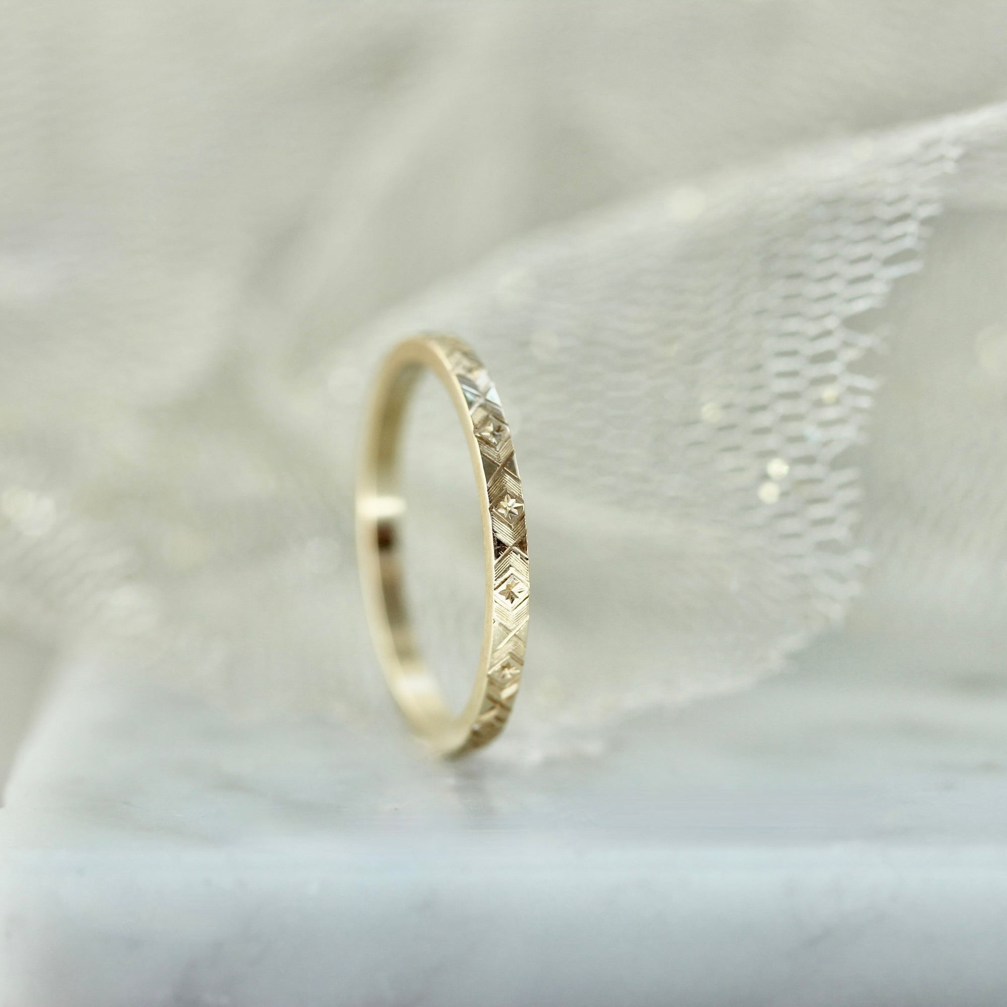 Hand engraved starburst band