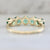 Genovia Round Brilliant Cut Emerald Band