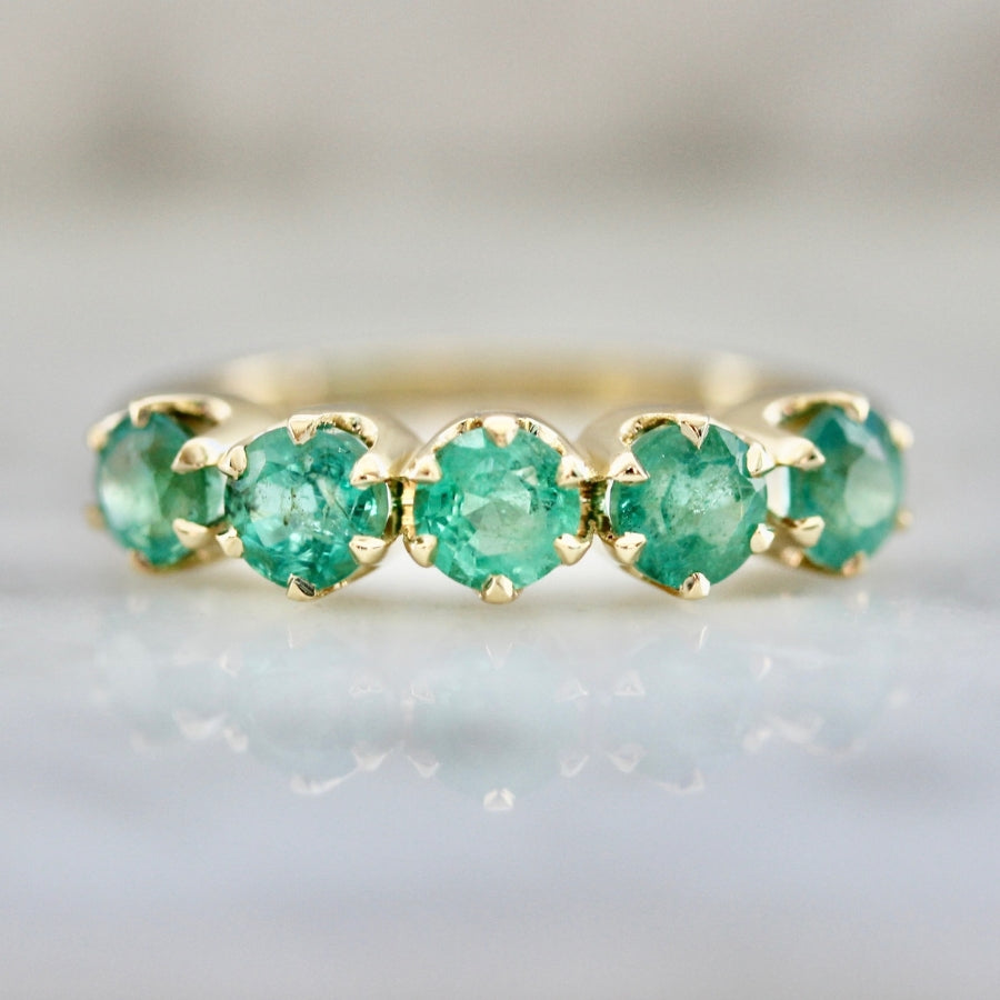 
            Genovia Round Brilliant Cut Emerald Band