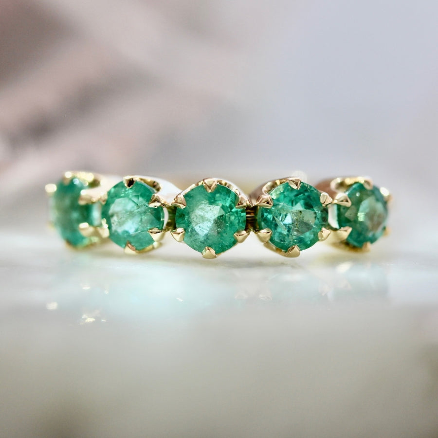 
            Genovia Round Brilliant Cut Emerald Band