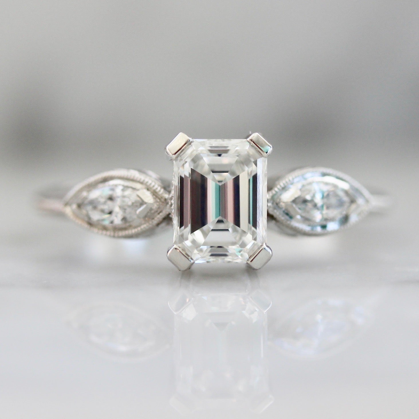 Gem Breakfast Custom Emerald Cut Diamond Ring With Vintage Details In Platinum And Marquise Cut Side Diamonds 3021