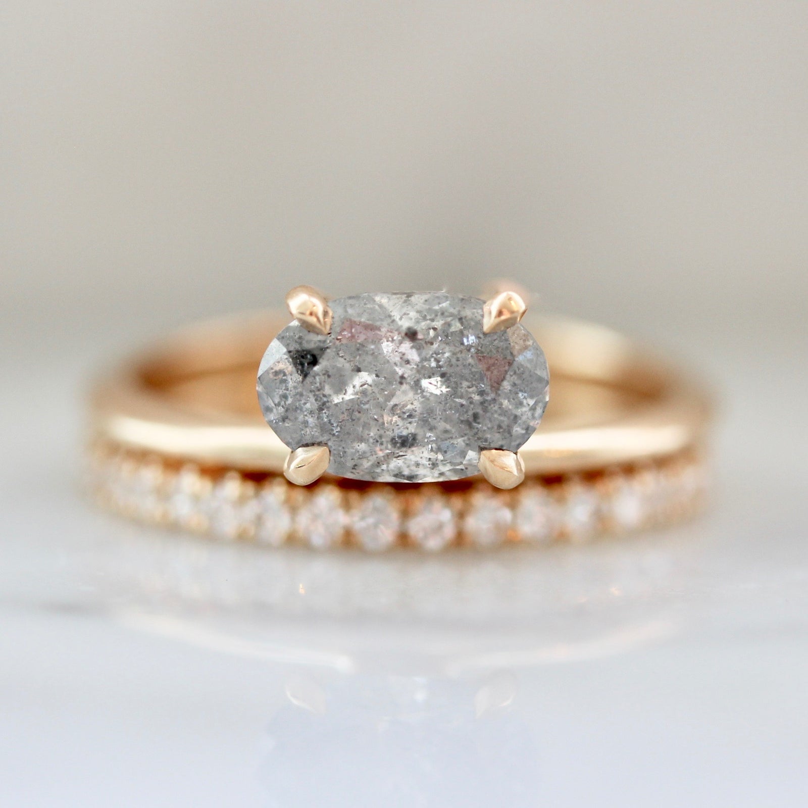 East West Oval Cut Salt & Pepper Diamond Ring in Hover Setting in 18k Peach Gold with 18k Peach Gold Pave Diamond Wedding Band 3089