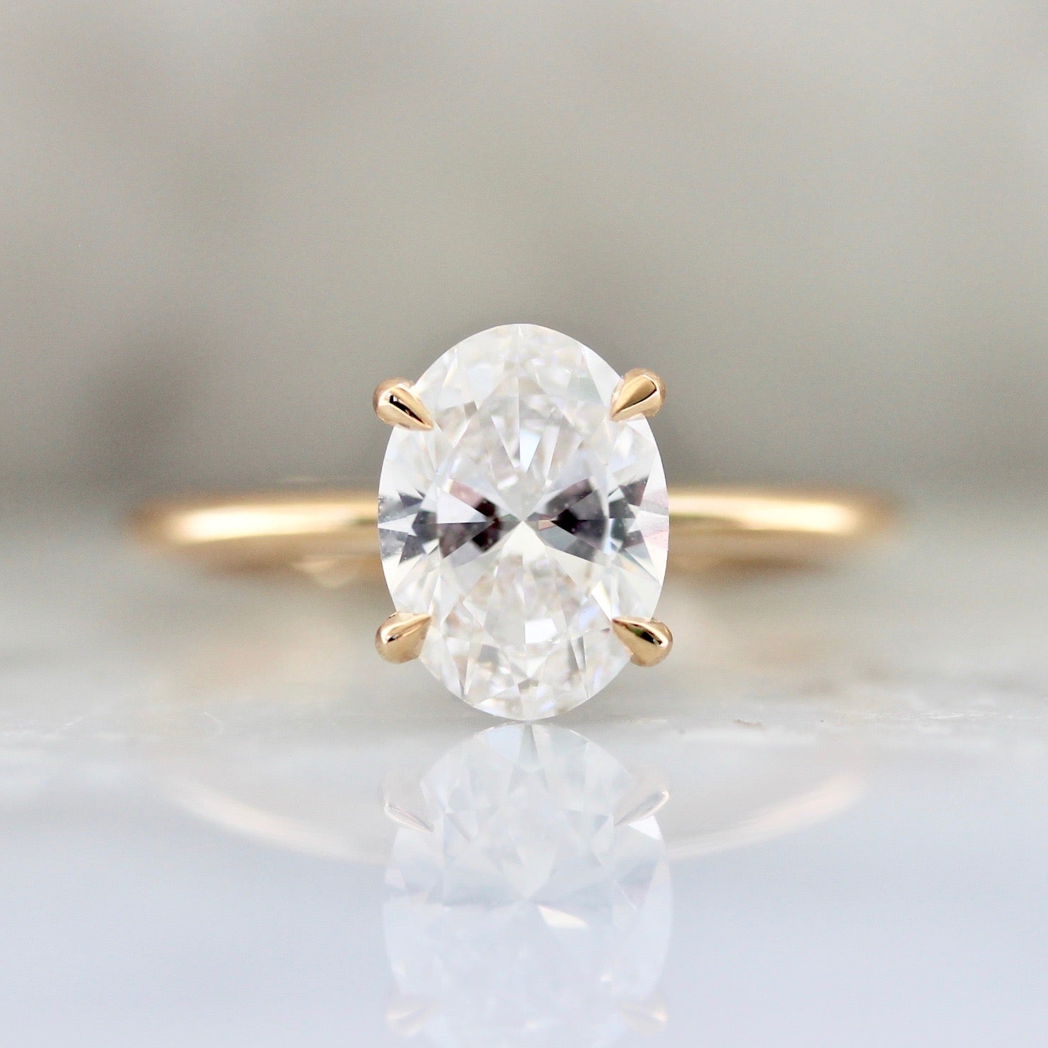 1.50 Oval Cut Diamond In Peach Gold