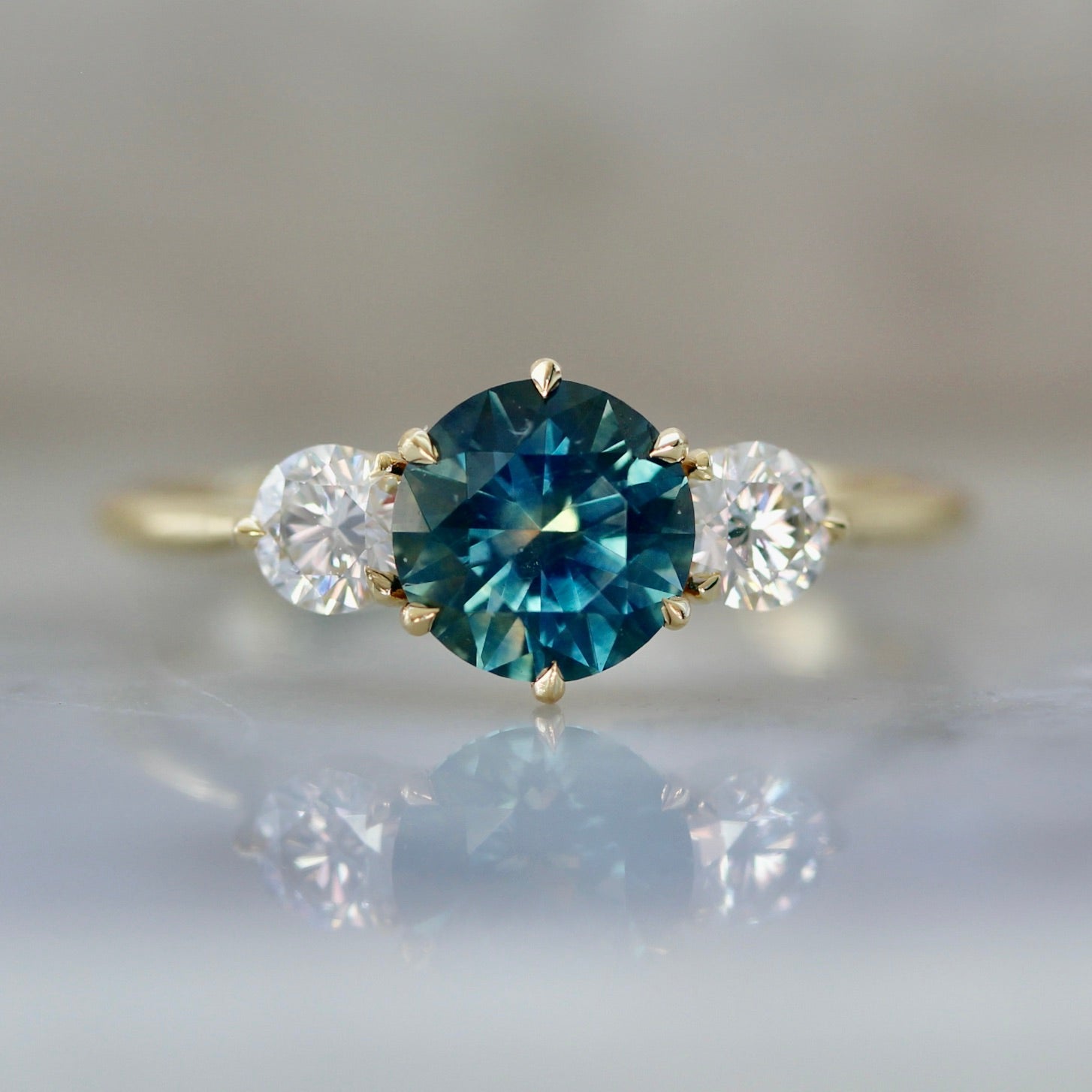 3779 Round Peacock Sapphire In Three Stone Setting 