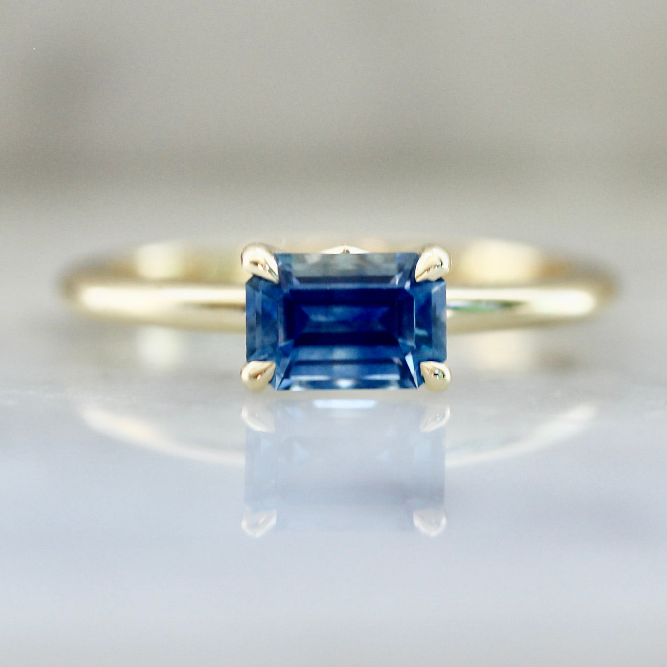 4201 - Blue Montana Sapphire Emerald Cut in Yellow Gold Harper Setting