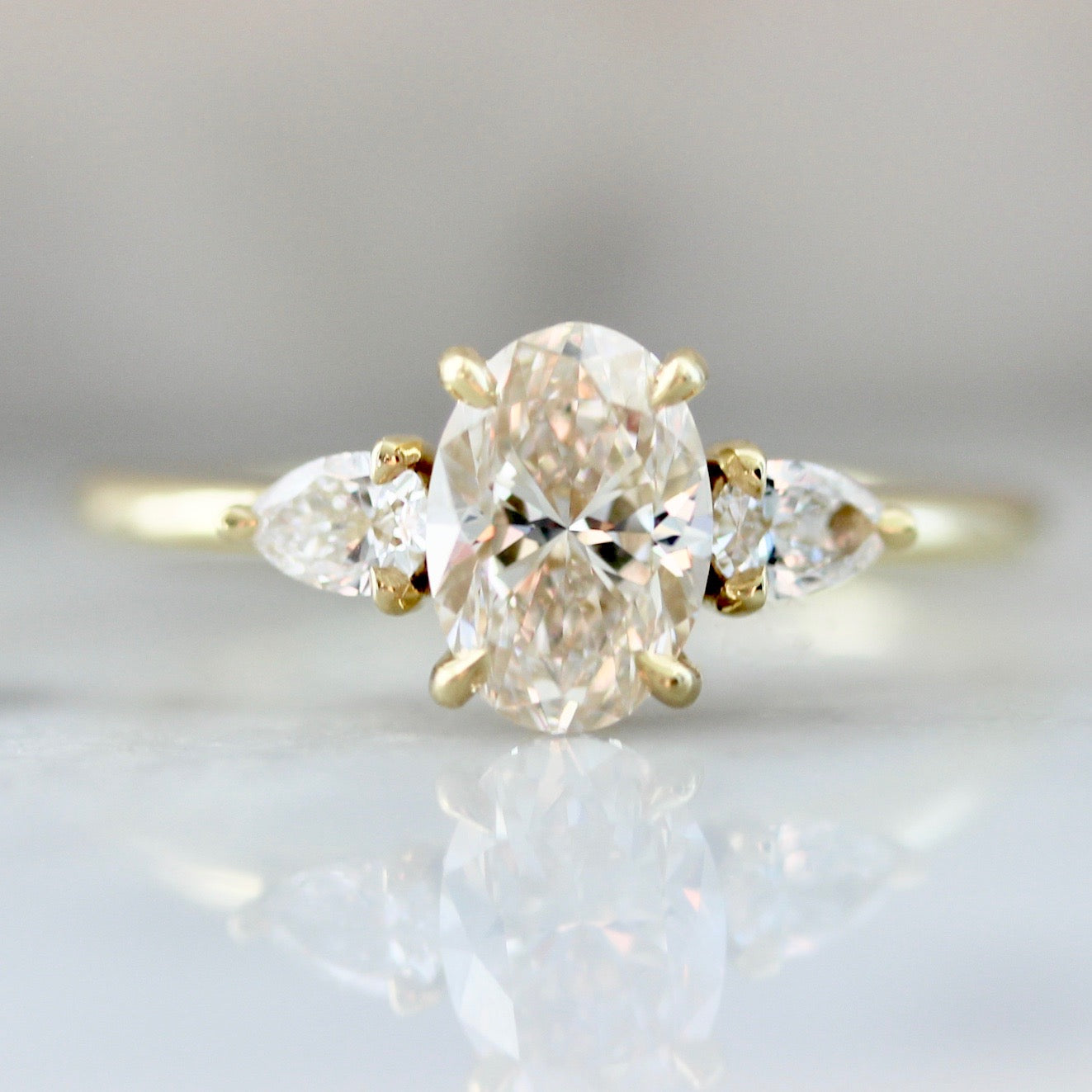 Champagne Oval Cut Diamond Ring with Pear Cut Side Diamonds in 18k Yellow Gold 2594
