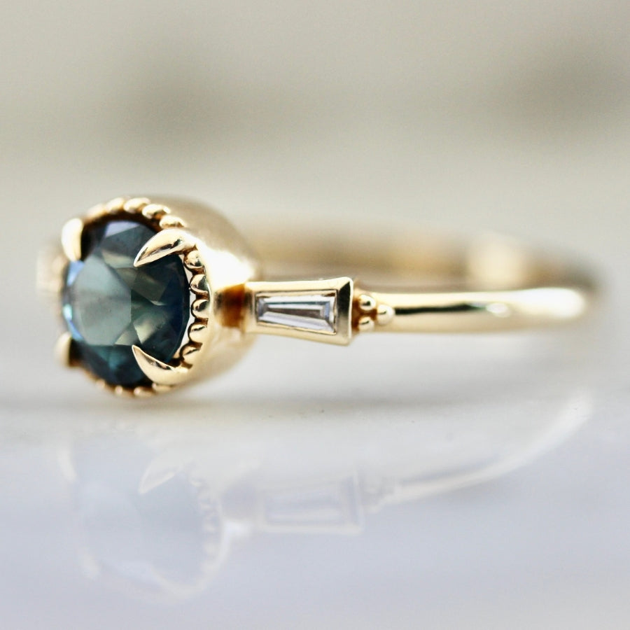 
            Isleview Teal Round Brilliant Cut Sapphire Ring