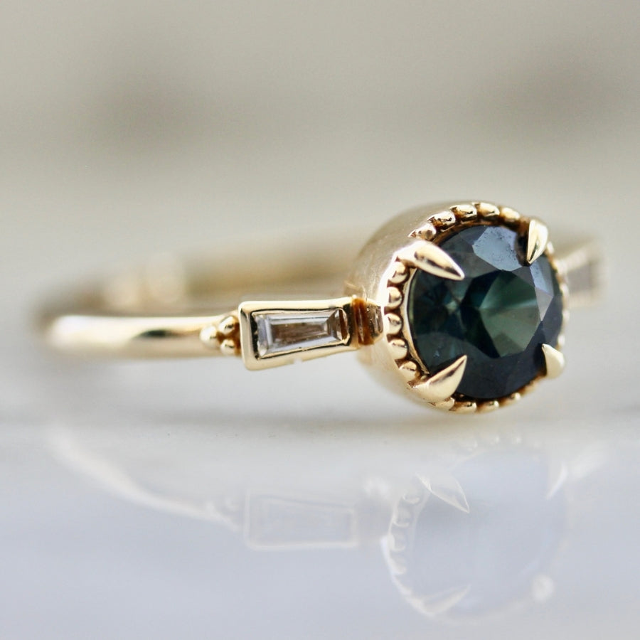 
            Isleview Teal Round Brilliant Cut Sapphire Ring