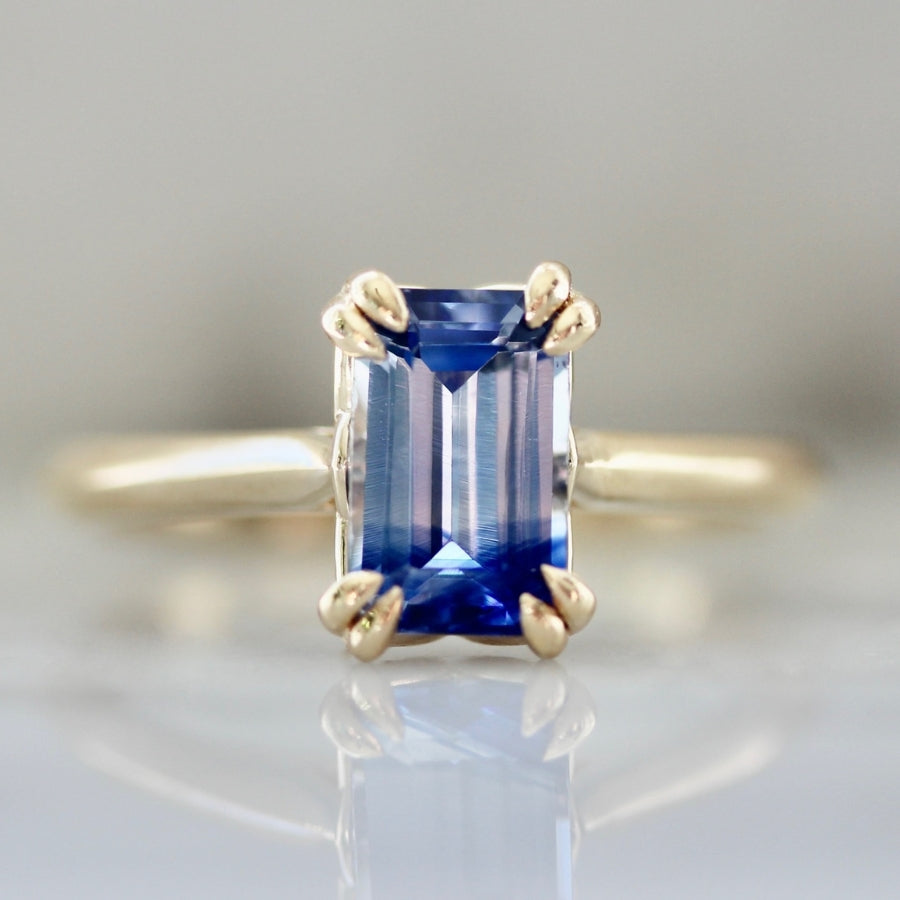 
            Jolly Rancher Blue Bi-Color Emerald Cut Sapphire Ring