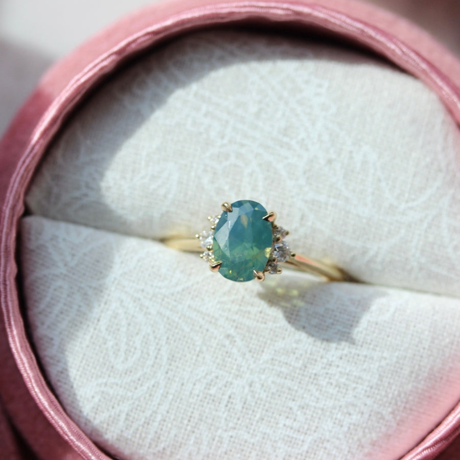 
            Jungle Jewel Green-Blue Oval Cut Opalescent Sapphire Ring