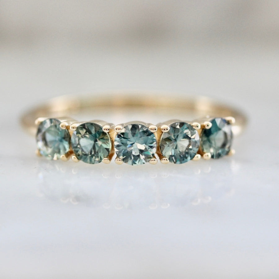 
            Lake Day Teal Round Brilliant Cut Sapphire Band