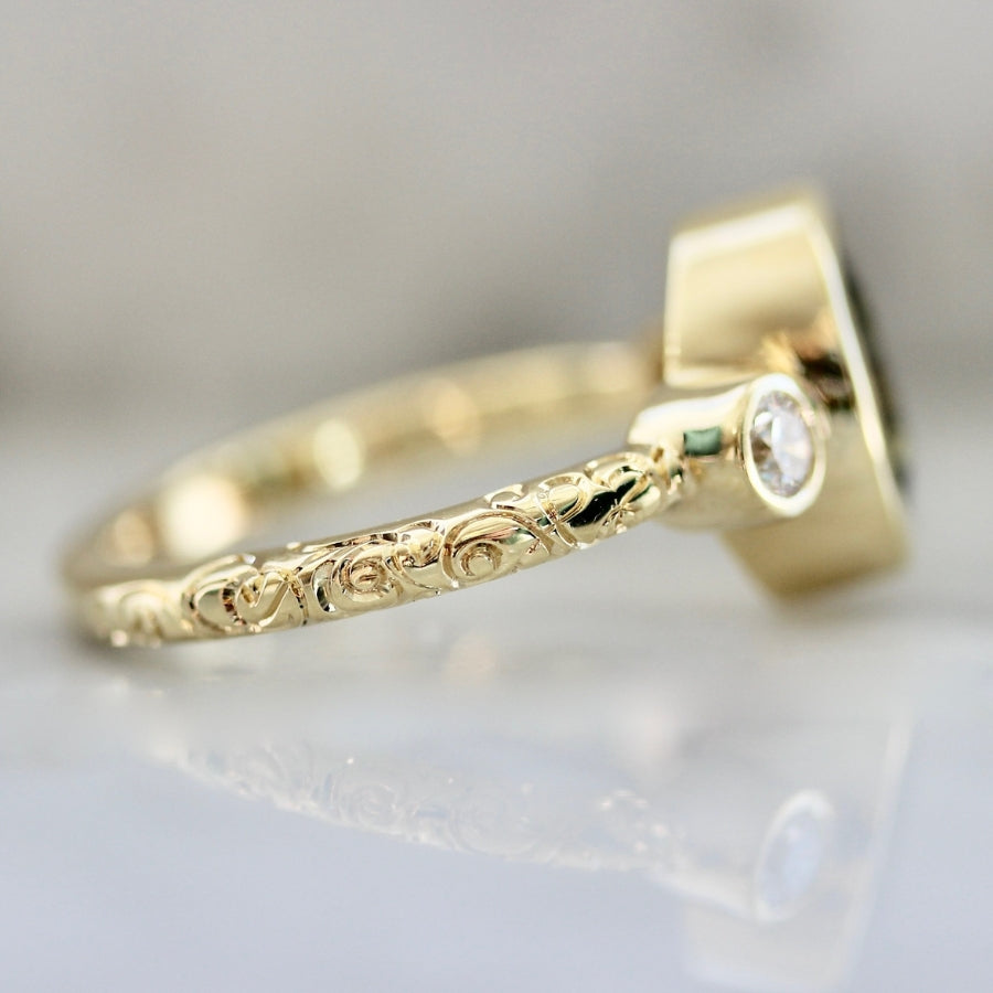 Lucky Charm Green Oval Cut Sapphire Ring