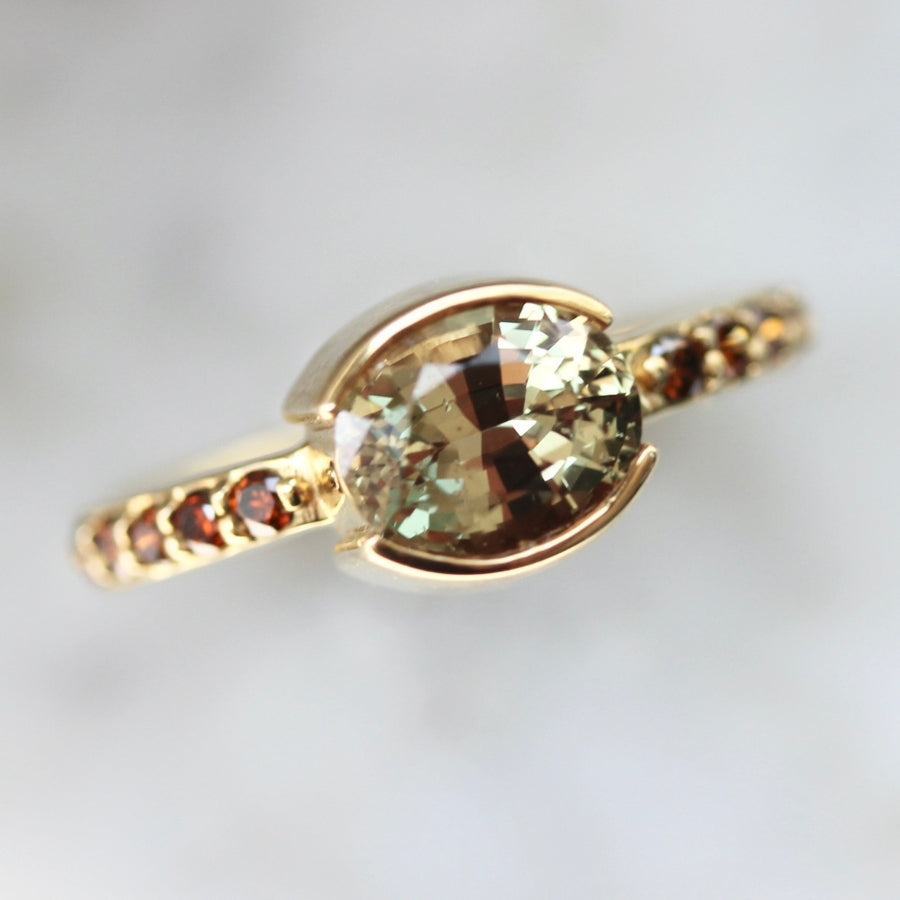 
            Mare Nubium Golden Oval Cut Sapphire Ring