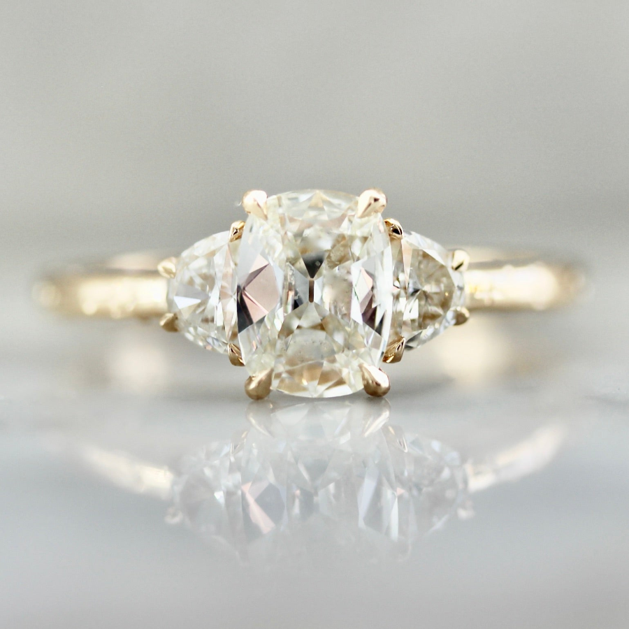 Three stone antique cushion cut diamond ring