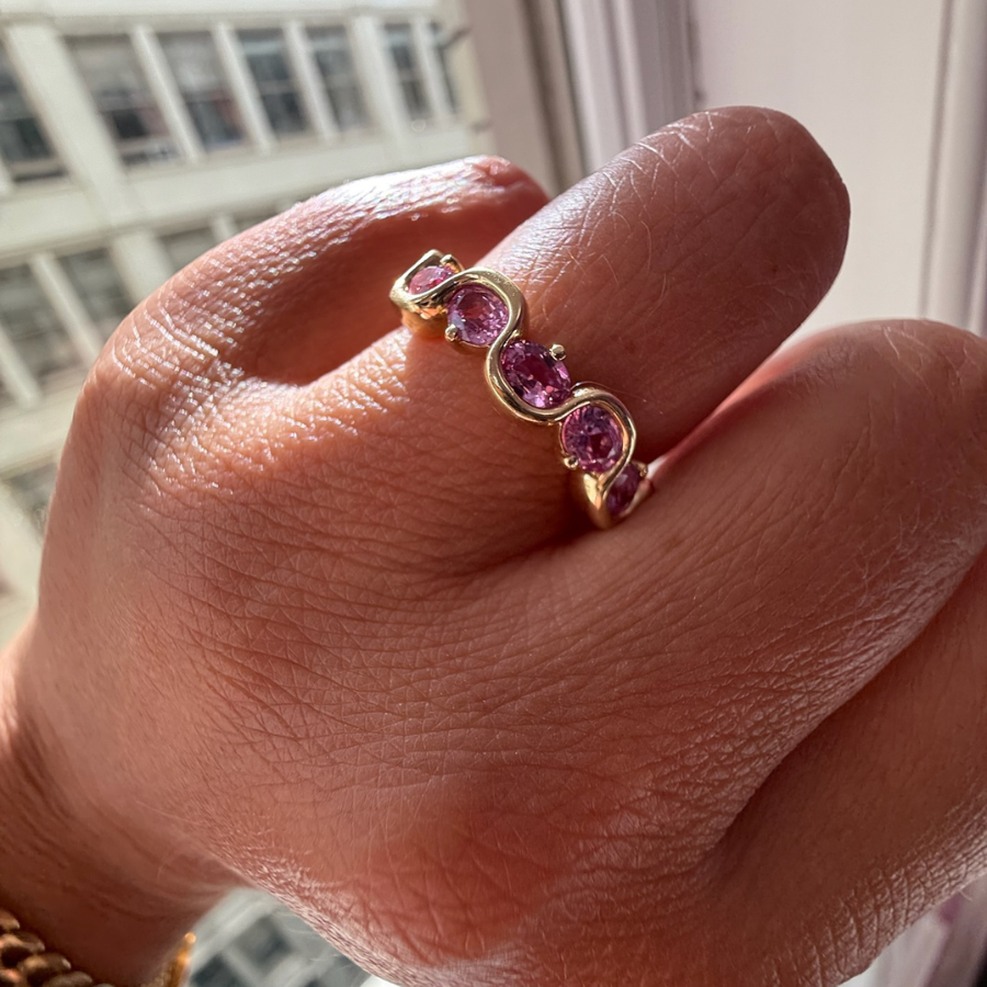 
            Pink Oval Cut Sapphire Band