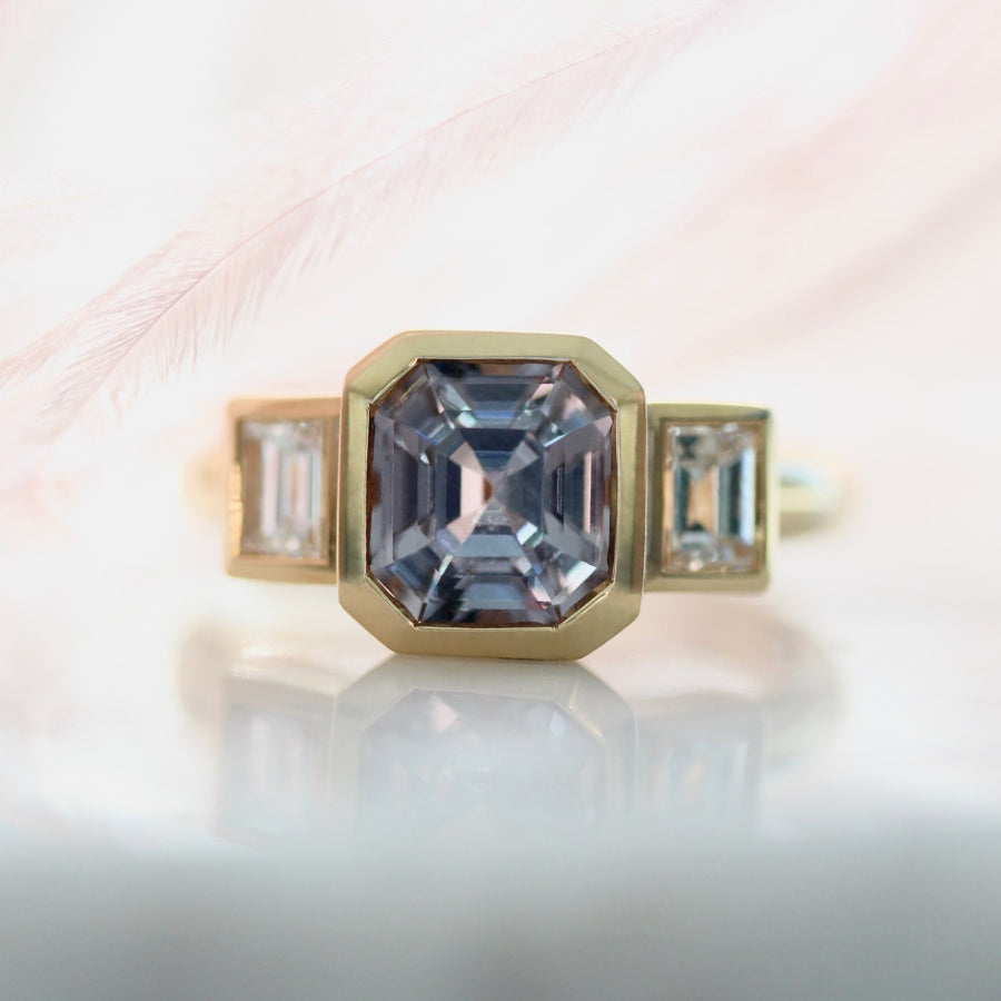 
            Prelude Purple-Blue Color Change Emerald Cut Spinel Ring