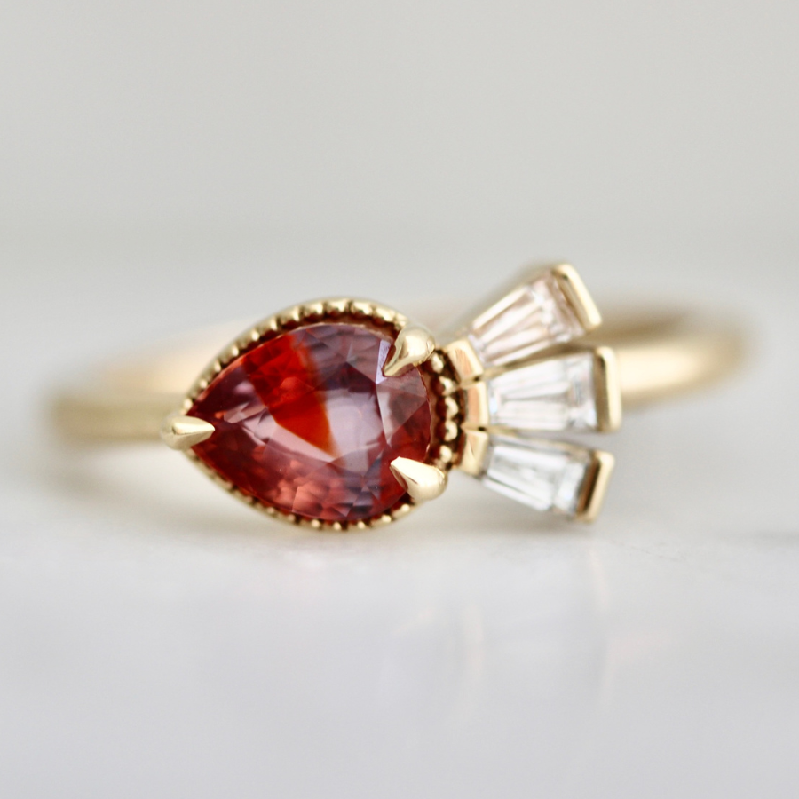
            Purple-Orange Pear Cut Sapphire Ring