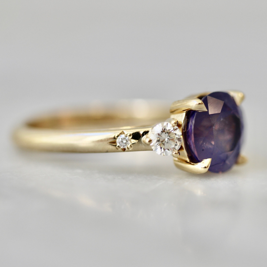 
            Purple Round Cut Opalescent Sapphire Ring