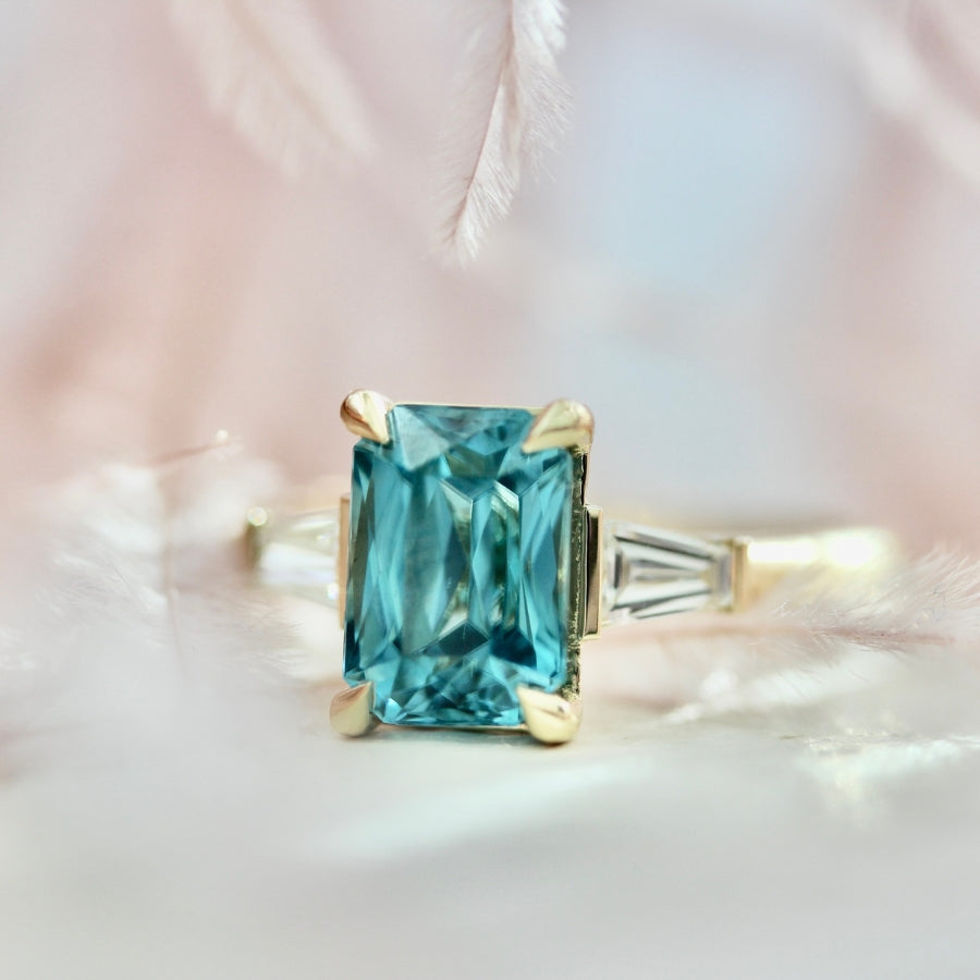 
            Regatta Teal Emerald Cut Zircon Ring