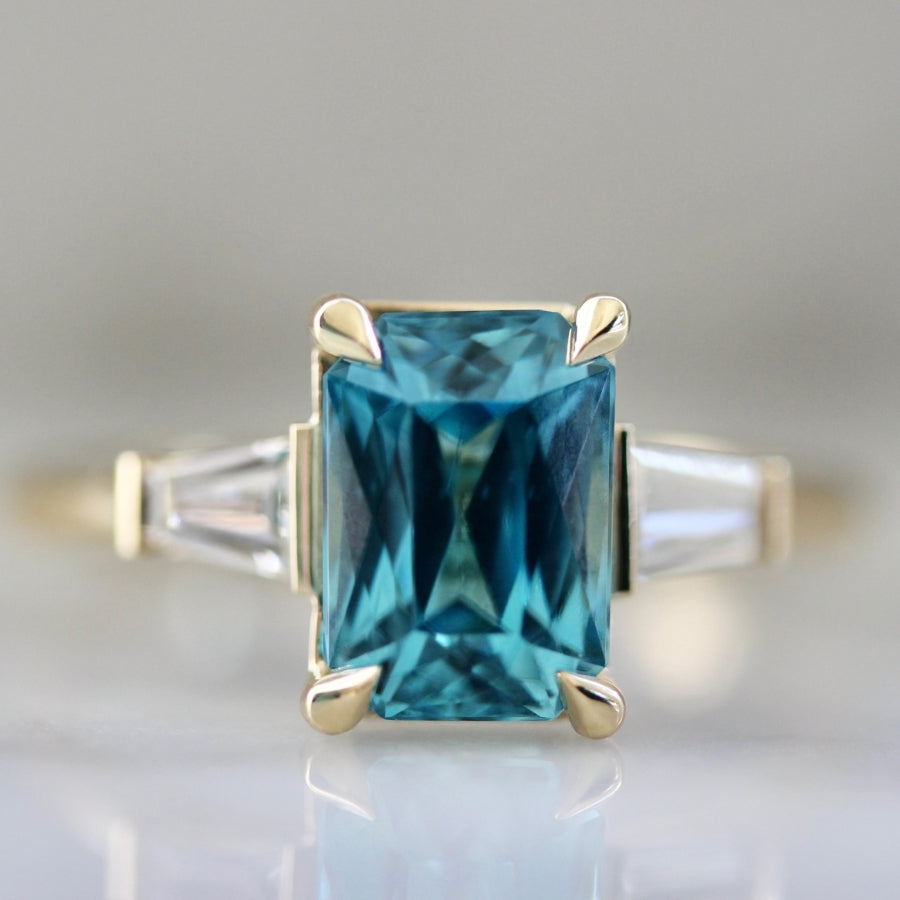 
            Regatta Teal Radiant Cut Zircon Ring