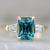 Regatta Teal Radiant Cut Zircon Ring