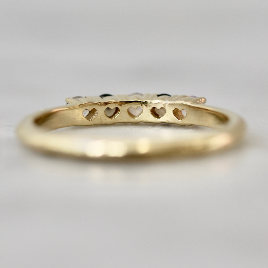 
            Round Cut Opalescent Sapphire Band