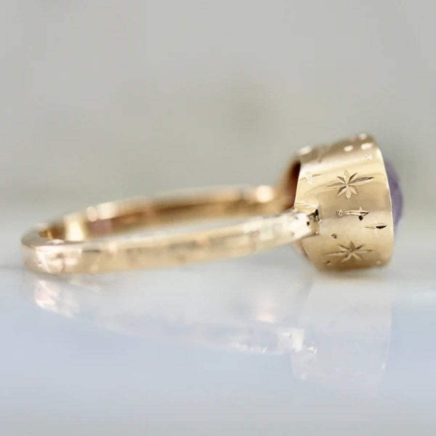 Six Candles Purple Oval Cut Opalescent Sapphire Ring