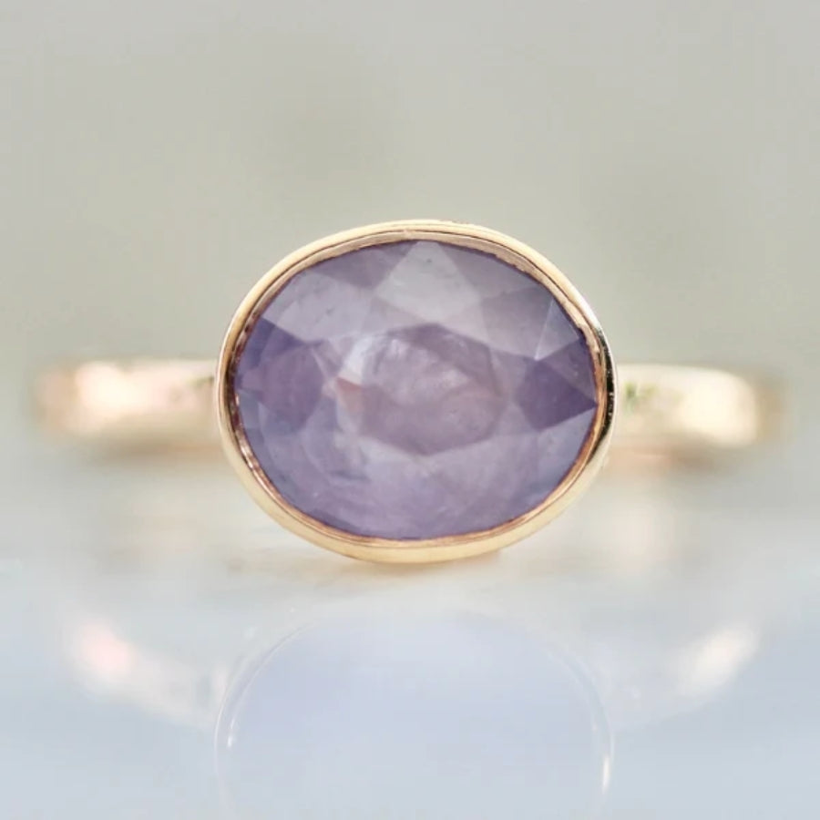 
            Six Candles Purple Oval Cut Opalescent Sapphire Ring