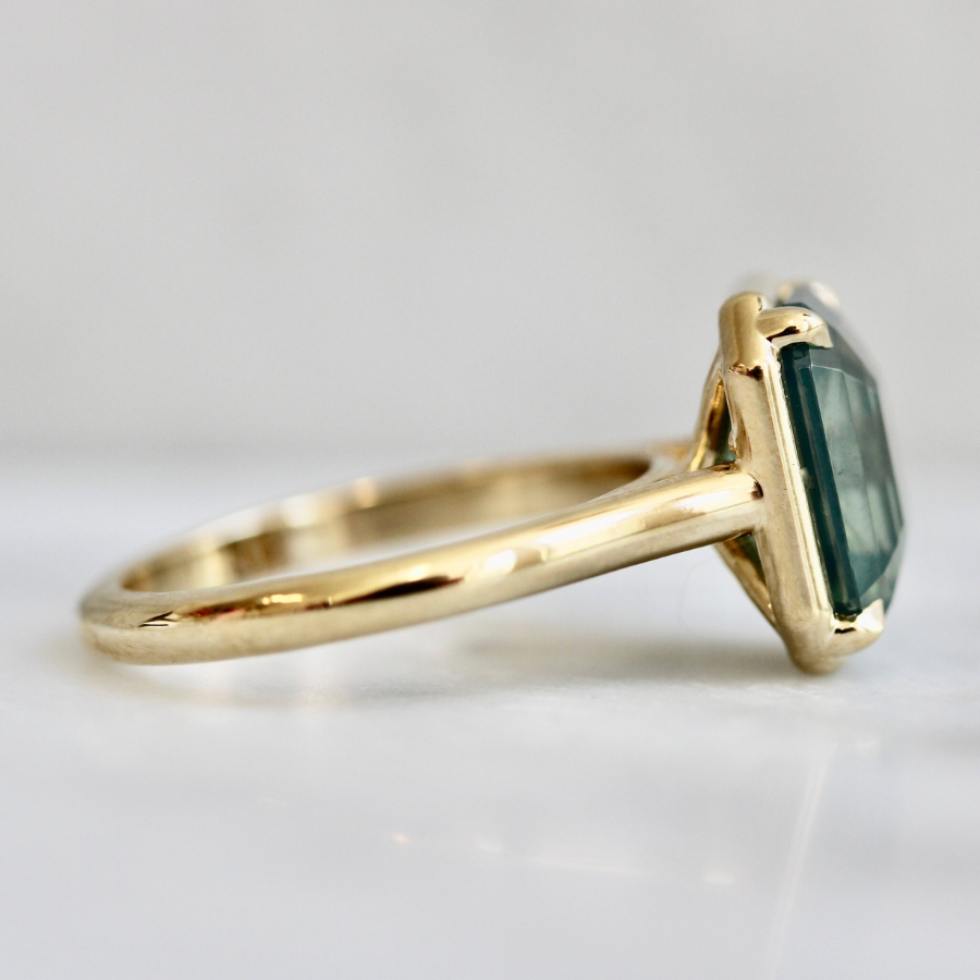 Teal Emerald Cut Opalescent Zircon Ring