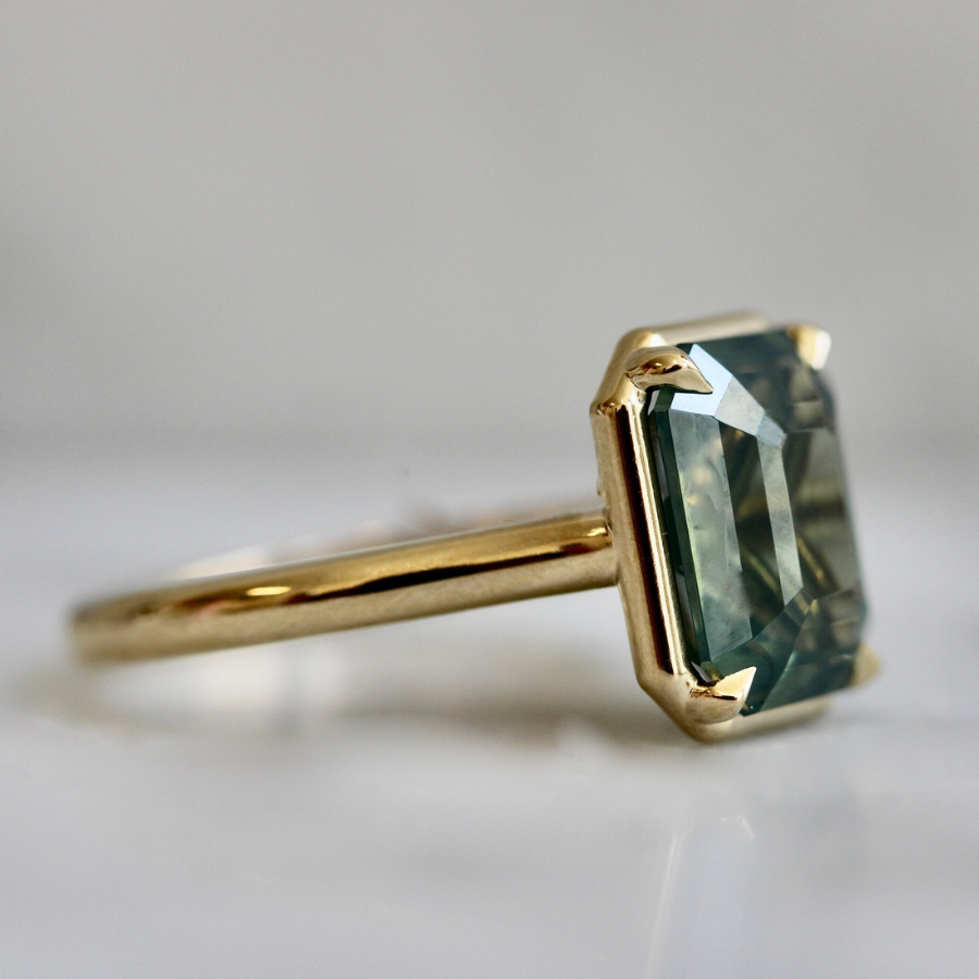 Teal Emerald Cut Opalescent Zircon Ring
