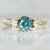 teal round brilliant cut sapphire ring