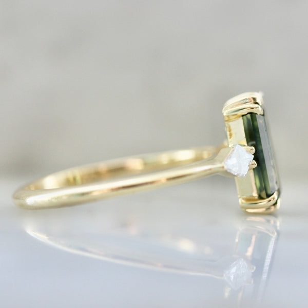 
            Water Lilly Green Emerald Cut Sapphire Ring