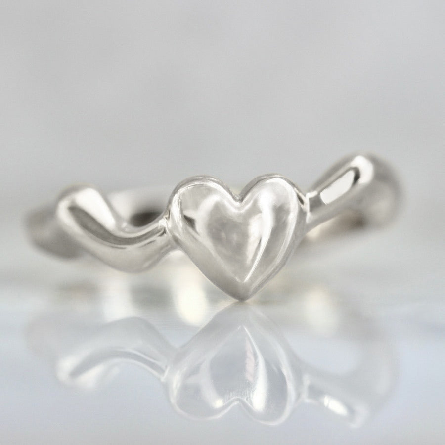 
            We Clicked Gold Heart Band in white gold
