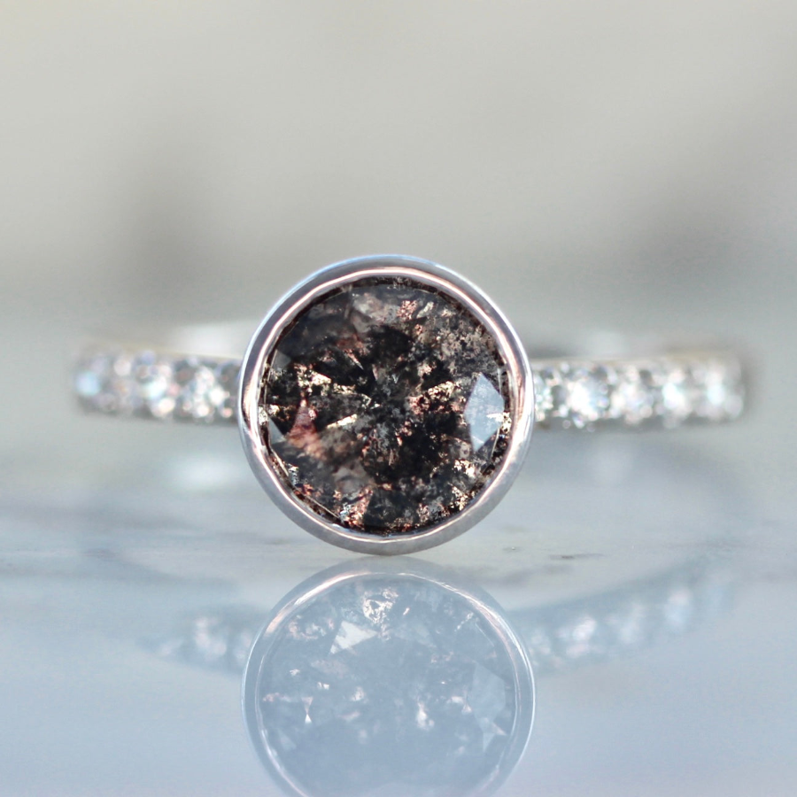 1285 White gold salt and pepper diamond ring with pave band