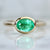 bezel emerald ring