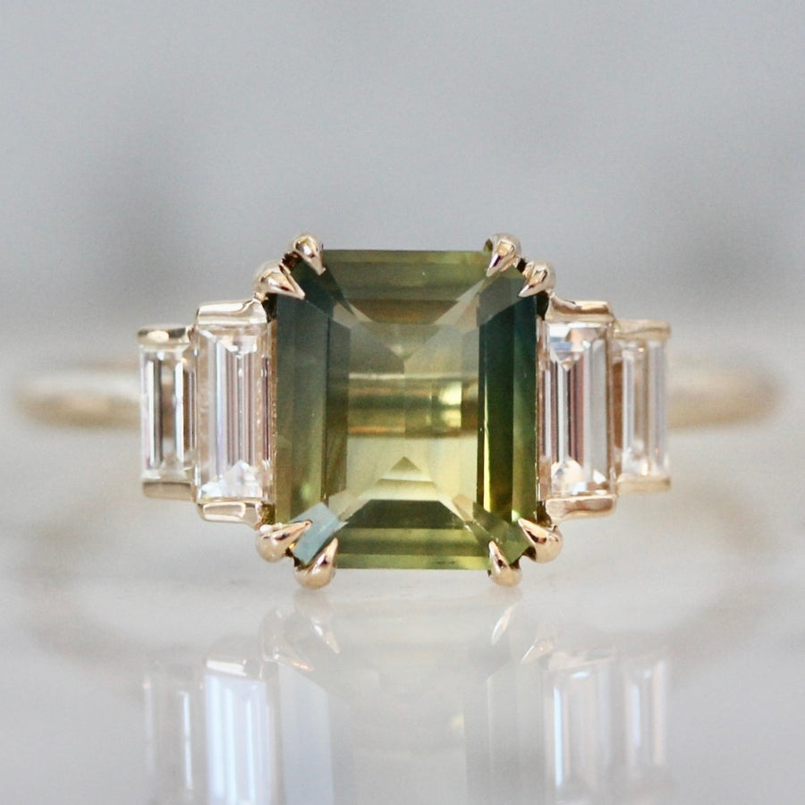 
            bi color emerald cut sapphire