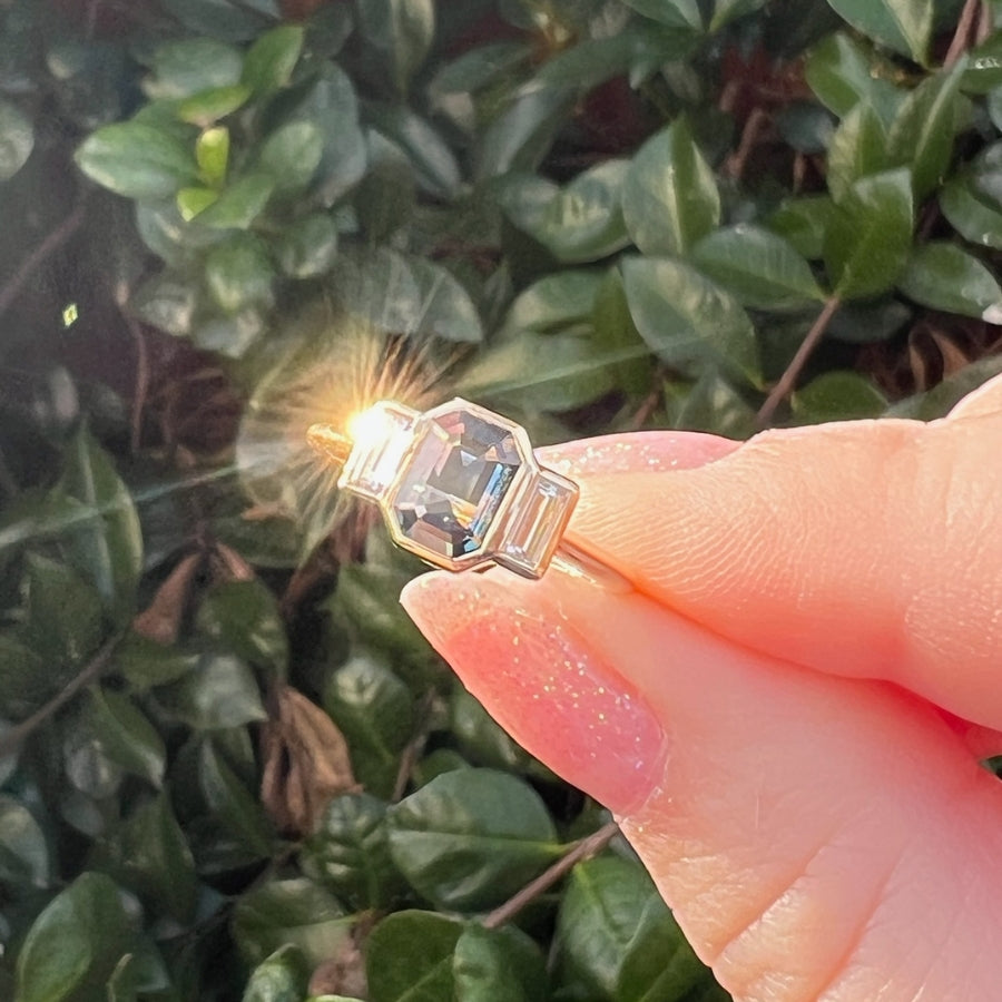 
            blue emerald cut sapphire engagement ring