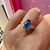 blue oval cut opalescent sapphire ring