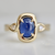 blue oval cut opalescent sapphire ring