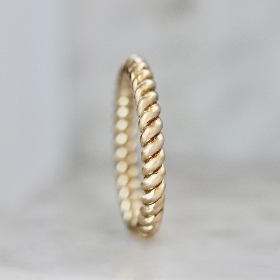 
            braided gold stacking ring