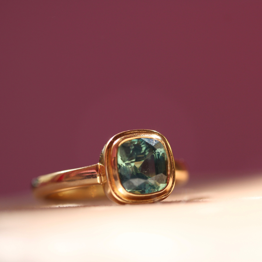 cushion cut teal sapphire ring