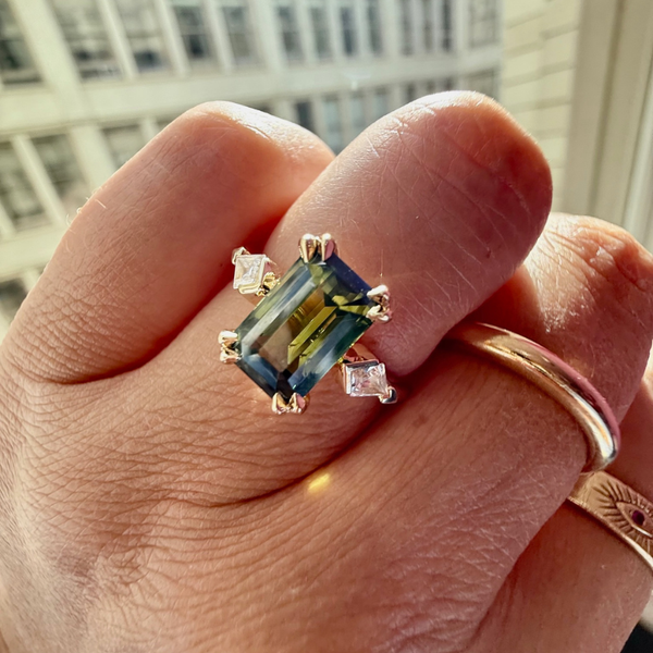 emerald cut green sapphire ring